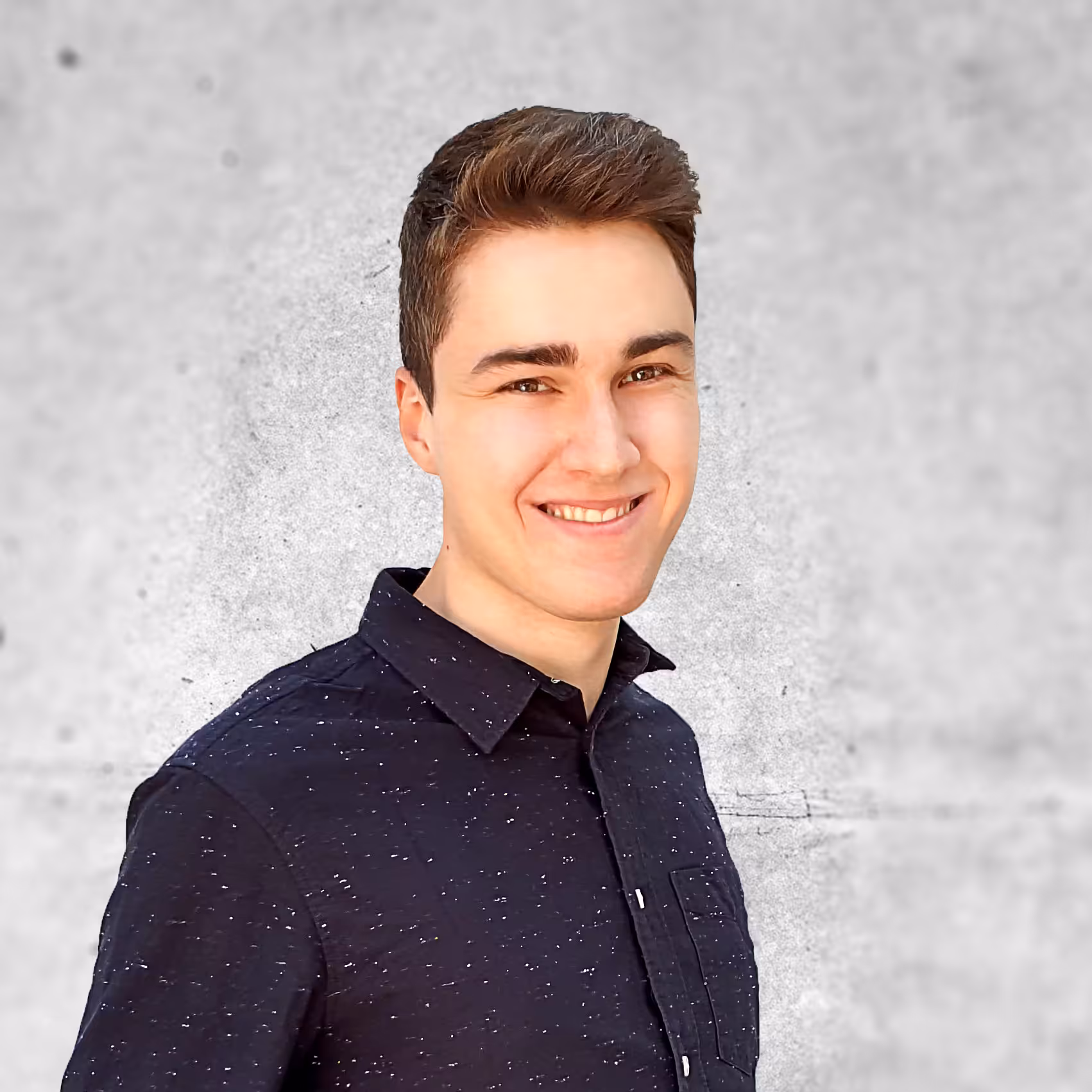 Portrait of a person smiling at the camera.