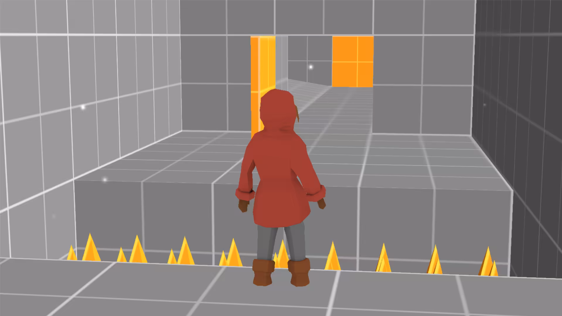 The player stands in front of a pit filled with spikes that lies between her and the next section.