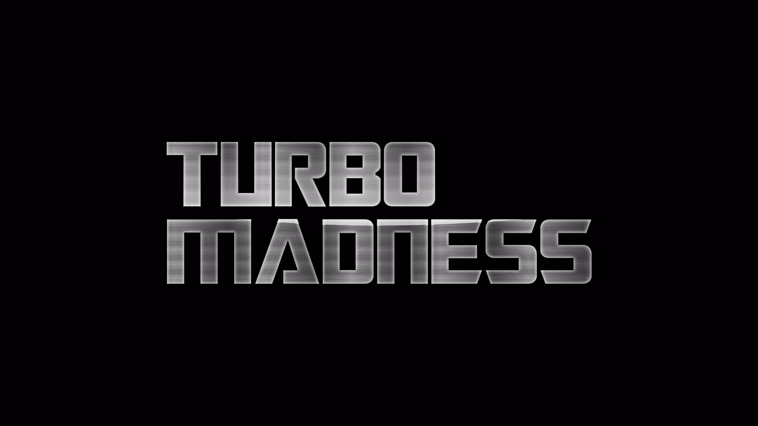 Turbo Madness logo featuring brushed metal lettering with a high-gloss coating.